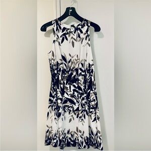 Maggy London knee length fit & flare sleeveless dress, white & black. Size 10.